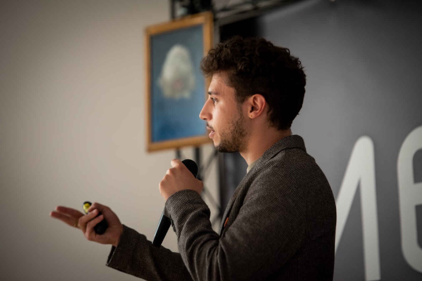 Gianluca Boccadifuoco discussing digital art with an audience